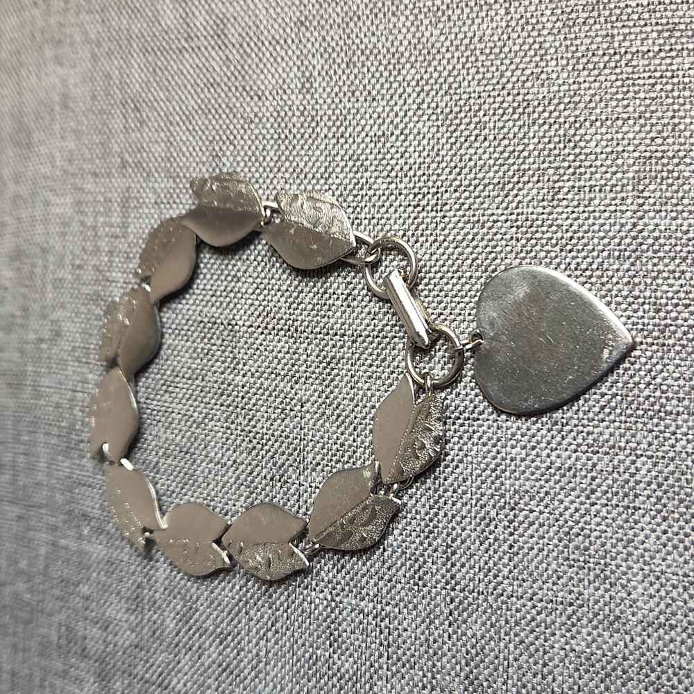 VINTAGE SILVER TONE CHARM BRACELETTE